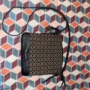 I’m selling my crossbody Tommy Hilfiger purse I’ve never used it so it’s new